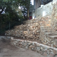 Melba - Building a retaining wall on the lowest level and then dry packed the remaining three retaining walls
